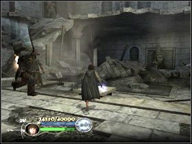 Dalej, przez wykrot w ścianie podziwiając ruiny miasta - Escape from Osgiliath (1) - Szlak Froda i Sama - Władca Pierścieni: Powrót Króla - poradnik do gry