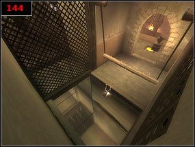 Przesuwając kamienną rzeźbę na zapadnie otwieramy bramę oraz odsłaniamy szczelinę, przez którą może wydostać się księżniczka [143] - Theres something glowing up there - Prince of Persia: Piaski Czasu - poradnik do gry