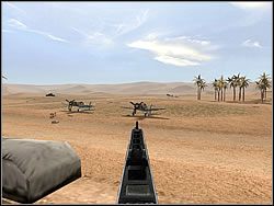 Korzystając dalej z szybkostrzelnego działka, skieruj tym razem ogień na stojące w okolicy samoloty - Spaghetti Airport cd. | Operation Nomad | Hidden and Dangerous 2 - Hidden and Dangerous 2 - poradnik do gry