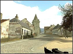 Poruszaj się drogą wysuniętą najbardziej na południe, w stronę domu mieszkalnego leżącego na skraju mapy - Annual Fair | Operation Liberator | Hidden and Dangerous 2 - Hidden and Dangerous 2 - poradnik do gry