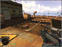 Na tyłach statku znajduje się miejsce, w którym musisz umieścić ładunek - Misja 14 - Boat | Far Cry - Far Cry - poradnik do gry