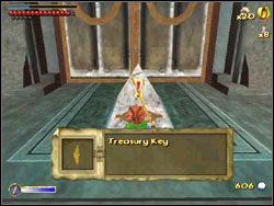 Gdy wskoczysz już na każdy z czterech znajdujących się w tym pokoju łańcuchów (po dwa z każdej strony drzwi) pojawi się miejsce, w które należy włożyć odlany klucz - 10 - The Gathering of the Clouds | The Hobbit - The Hobbit - poradnik do gry