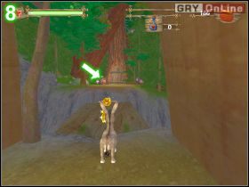 Obróć się w lewo - na wzgórzu stoi dwóch wieśniaków rzucających w ciebie z dyniami - [POZIOM 04] Angry Peasants | Shrek 2 The Game - Shrek 2: The Game - poradnik do gry
