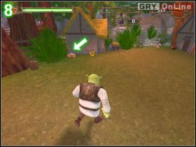 Druga znajduje się blisko bramy, zasłonięta przez skrzynkę-niespodziankę - [POZIOM 09] The Potion Fails cz.1 | Shrek 2 The Game - Shrek 2: The Game - poradnik do gry