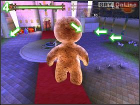 Wozy są potrzebne po to, by rzucać nimi w most zwodzony (górna strzałka na obrazku [3] ), używaj do tego przycisku walki (lewy przycisk myszy) - [POZIOM 15] Giant Gingy Attack | Shrek 2 The Game - Shrek 2: The Game - poradnik do gry