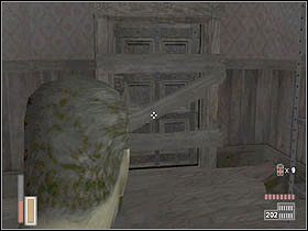 Przechodzimy przez mały pokoik rozwalając przy tym deski blokujące przejście przez drzwi - [Poziom 11] cz.2 - The Suffering - poradnik do gry