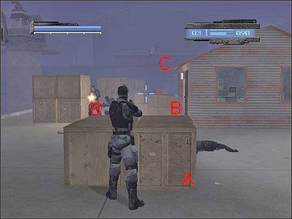 Tuż po zakończeniu intra wejdź jak najszybciej po kładce na górę, przejdź koło beczek i szybkim skokiem przykucnij przy skrzyni (A) - Misja 17 - False Front | kill.switch - kill.switch - poradnik do gry