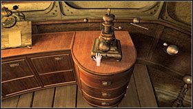 Rozejrzałem się ostrożnie dookoła, pomyszkowałem nieco (chociaż może to trochę niegrzecznie) po szafkach i szufladach, ale niczego konkretnego nie znalazłem - Myst IV: Objawienie - poradnik do gry