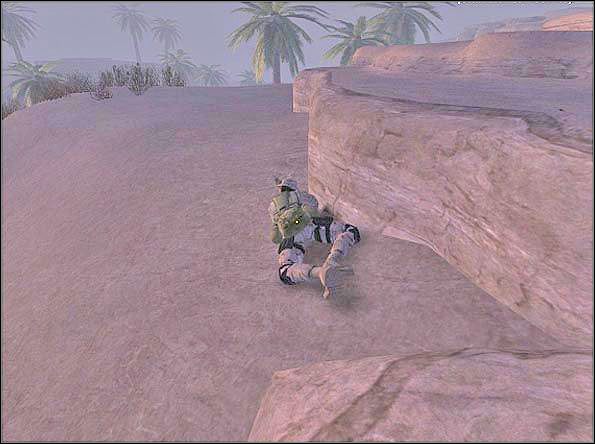 Idąc prawą stroną można się wdrapać na górę i położyć tuż za kamieniem - tak jak to widać na screenie - Defense (1) | SF Oasis | Americas Army Special Forces - Americas Army: Special Forces - poradnik do gry