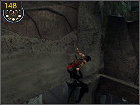 Stamtąd wychodzimy na urwany chodnik [147], z którego po ścianie dostajemy się na wystający ze ściany fragment skały [148] - Południowe przejście - teraźniejszość (3) | Dama w niebezpieczeństwie, Mroczna dłoń losu - Prince of Persia: Dusza Wojownika - poradnik do gry