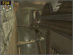 Tam schodzimy w dół po wystających fragmentach konstrukcji [723] i skaczemy z belki przez wirujące koło [724] - Mechaniczna jama - przeszłość | Wyścig do tronu | PoP Dusza Wojownika - Prince of Persia: Dusza Wojownika - poradnik do gry