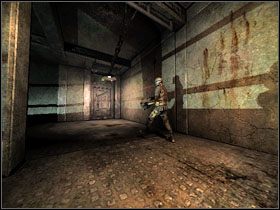 Skorzystaj z drzwi, przez które przeszedł, aby znaleźć się w pomieszczeniu ze stacją zdrowia NanoMED (NanoMED Health Station ) - 05 - Infirmary | Solucja | Kroniki Riddicka Ucieczka z Butcher Bay - Kroniki Riddicka: Ucieczka z Butcher Bay - poradnik do gry