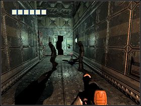 Udaj się teraz, wchodząc wcześniej po pobliskiej drabince, w stronę drzwi, gdzie wcześniej stał Mosley - 23 - Mining Core (2) | Solucja | Kroniki Riddicka Ucieczka z Butcher Bay - Kroniki Riddicka: Ucieczka z Butcher Bay - poradnik do gry