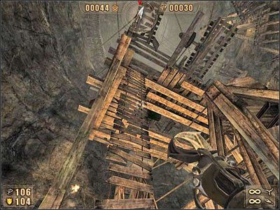 i z pierwszego poziomu pomostu skoczyć na chodnik, na którym będziemy mogli znaleźć nieco amunicji i zbroję - 6.9 Jaskinia cz.1 | Painkiller Battle Out of Hell - Painkiller: Battle Out of Hell - poradnik do gry