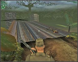 Cofamy się wzdłuż rzeki aż do dużego mostu, na którym znajduje się poszukiwany przez nas tubylec - Find The Uwa Tribe - Kolumbia - Hitman: Codename 47 - poradnik do gry