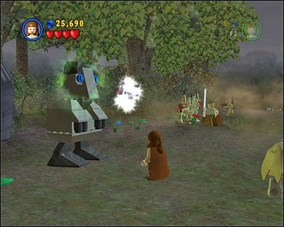 Tuż przed końcem etapu zobaczysz trzy segmenty robota - nogi, tułów i głowę - rozrzucone po ziemi - [E1] Chapter 2 - Kanistry 8-10 - LEGO Star Wars - poradnik do gry