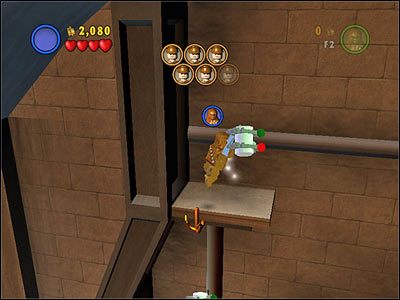 W hangarze, w miejscu w którym uwalniasz pojedynczego pilota w lewym końcu sali, użyj haka do wspinaczki, a kanister będzie Twój - [E1] Chapter 5 - Kanistry 8-10 - LEGO Star Wars - poradnik do gry