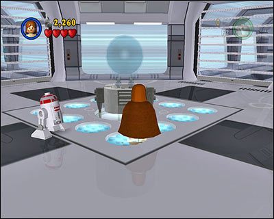 W pomieszczeniu widocznym powyżej szybko przejdź po niebieskich punktach tworzących kwadrat, a następnie użyj Mocy na urządzeniu, które się wysunęło - [E2] Chapter 1 - Discovery on Kamino - LEGO Star Wars - poradnik do gry