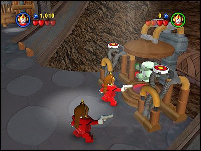 Musisz strzelić w obie tarcze zawieszone na mechanizmie po prawej stronie sali, w której walczysz z Dooku - [E2] Chapter 5 - Kanistry 7-10 - LEGO Star Wars - poradnik do gry