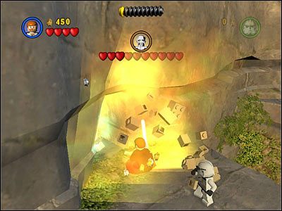 Generał wycofa się po raz trzeci, zniszcz wtedy ścianę z klocków pokazaną na screenie i używając Mocy przetransportuj ukryty za nią kontener nieopodal robota - [E3] Chapter 3 - General Grevious - LEGO Star Wars - poradnik do gry