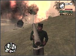 Podnieś leżącą na płycie rakietnicę, zeskocz na ulicę i rozpocznij pościg za helikopterem - GTA San Andreas: Triada (czerwony znak Triady) - San Fierro, solucja - GTA San Andreas - poradnik do gry