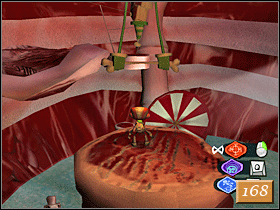 Na półce w oddali znajdują się dwa słupki, a między nimi liny - Meat Circus (2) | Solucja | Psychonauts - Psychonauts - poradnik do gry