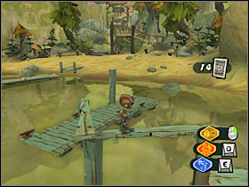16. Z plaży przeskocz na kładkę widoczną na screenie. Na desce, na której stoi Raz, znajdziesz kartę. - Boathouse and Beach (1) | Lokalizacje przedmiotów | Psychonauts - Psychonauts - poradnik do gry