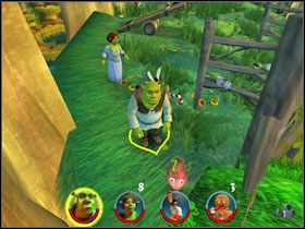 Podnosimy wybuchową beczkę, stajemy na widocznej na rysunku stronie kołyski i rzucamy przedmiotem w drugi koniec, by znaleźć się za bramą przed nami - [Solucja] Etap 1 - Bagno Shreka cz.3 | Shrek 2 Team Action - Shrek 2: Team Action - poradnik do gry