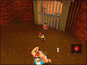 Następnie odpalamy pochodnię od pobliskiego ogniska i wracamy - odbijając się od zawieszonej na dwóch kołkach gumy - do miejsca obok budynku, w którym znaleźliśmy laur - Etap 1 | Egipt | Asterix & Obelix XXL - Asterix & Obelix XXL - poradnik do gry