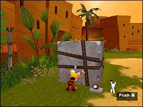 Korzystając z zawieszonej na drewnianych palach gumy, przedostajemy się do skrzyń, nad którymi wisi magiczny napój - Etap 4 | Egipt | Asterix & Obelix XXL - Asterix & Obelix XXL - poradnik do gry