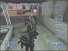 Teraz musisz tylko odeskortować zakładników do znajdującej się obok strefy ewakuacyjnej (screen 1) - Misja 12 - Showdown cz.4 | Conflict Global Storm - Conflict: Global Storm - poradnik do gry