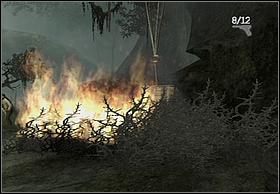 Aby się do niej dostać podnieś jedną z kości, które leżą nieopodal i podpal ją na ogniu z budynku - [Solucja] Swamps cz.1 | Peter Jacksons King Kong - Peter Jacksons King Kong - poradnik do gry