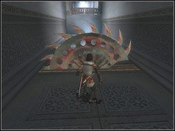 Zalicz dwa zakręty w lewo, a ujrzysz połówkę obracającej się tarczy, wyglądającej jak ogromny tartaczny trak - [05] The Palace (pałac) | Prince of Persia Dwa Trony - Prince of Persia: Dwa Trony - poradnik do gry