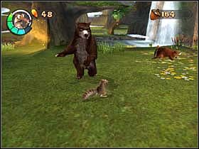 Idąc dalej, zwróć uwagę na szczelinę znajdującą się w drzewie, nieopodal przechadzają się niedźwiedź oraz bóbr - FOREST 01 - Epoka Lodowcowa 2: Odwilż - poradnik do gry