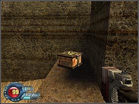 Zanim wejdziesz do magazynu, którego drzwi otwiera zielony przycisk, obejdź skrzynki ustawione po prawej stronie - Docks - Trainyard | Sekretne lokacje w SiN Episodes Emergence - SiN Episodes: Emergence - poradnik do gry