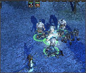 Nieopodal miejsca gdzie znalazłeś posągi gigantów wrze wielka bitwa - ludzie walczą z bestiami (19) - The Catapults of Underhall - Underhall (3) | Threatened Homelands - Spellforce 2: Czas Mrocznych Wojen - poradnik do gry