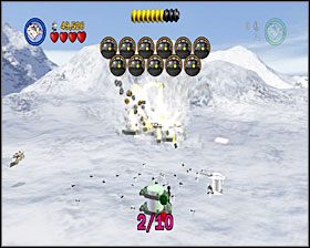 Na polu bitwy pod koniec etapu, wystarczy byś zniszczył szare konstrukcje widoczne na screenie obok - Episode V - Hoth Battle | Freeplay Mode - LEGO Star Wars II: The Original Trilogy - poradnik do gry