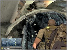 Powinieneś zbliżyć się do zniszczonego śmigłowca (#1), który pojawił się w początkowej fazie tego etapu - Kinshasa (1) | Misja 9.3 w Splinter Cell Double Agent - Tom Clancys Splinter Cell: Double Agent - poradnik do gry