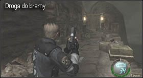 Gdy będziesz mógł się poruszać miń pobojowisko powstałe w wyniku walki i udaj się w kierunku bramy z dwoma pochodniami po bokach - Island (5-4) - zestrzelony helikopter | Solucja Resident Evil 4 - Resident Evil 4 - PC - poradnik do gry