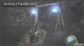 Teraz udaj się łodzią do miejsca nieco oddalonego, tam skąd bije niebieskie światło - Village (2-1) - jezioro po walce | Solucja Resident Evil 4 - Resident Evil 4 - PC - poradnik do gry