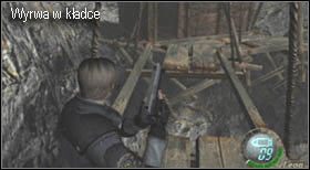 Idąc przez niewielki odcinek drogi natrafisz na wyrwę w kładce, a przed nią, pod deskami, medalion - Village (1-3) - cmentarz | Solucja Resident Evil 4 - Resident Evil 4 - PC - poradnik do gry
