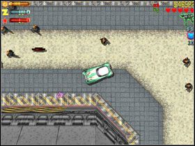 Ostatnim celem jest wóz policyjny, który znajduje się na przyczepie - Zaibatsu (2) | Industrial | GTA 2 - GTA 2 - poradnik do gry