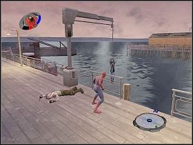 Następnie szybko wciśnij przycisk [1] , dzięki czemu przywieszony do haka człowiek będzie wyciągane do góry - Part 1 - Catch of the Day - Apocalypse - Spider-Man 3: The Game - poradnik do gry