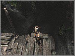 Wejdź po drewnianych platformach po lewej na szczyt konstrukcji zabierz amunicję do p - Poziom 04. Zaginiona Dolina | Sekrety w Tomb Raider Anniversary - Tomb Raider: Anniversary - poradnik do gry