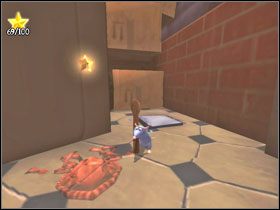 Wróć w kierunku stolika i skręć w lewo - znajdziesz tam paczkę #1 - The City Market (3) | Solucja Ratatuj - Ratatuj - poradnik do gry