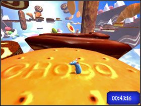 Następnie przeskocz na czekoladowe ciastko. - Dream Worlds - Desserted Wonderland | Single-Player Minigames | Ratatuj - Ratatuj - poradnik do gry