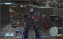 W sąsiedztwie tego samego boiska sportowego znajduje się parking - More Than Meets the Eye - Ikony | Kampania Autobotów | Transformers The Game - Transformers: The Game - poradnik do gry