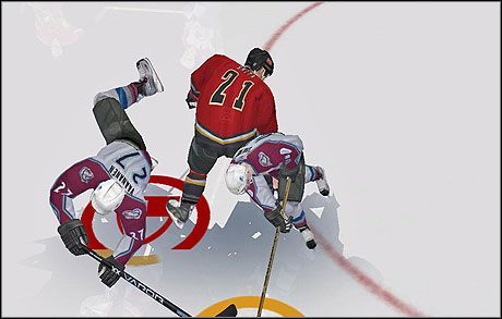 Odbieranie krążka często przebiega w brutalny sposób. - Gra w obronie | Podstawowe informacje | NHL 08 - NHL 08 - poradnik do gry