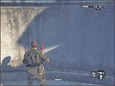 Możesz też umiejętnie ukrywać się i strzelać do maszyny dopiero wtedy gdy pojawi się nad Twoją głową (screen) - Rozdział 11 - Freedom Fighters cz.5 | Kane & Lynch Dead Men - Kane & Lynch: Dead Men - poradnik do gry