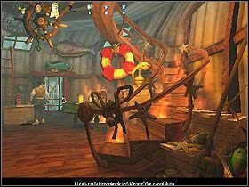 Tam skieruj się najpierw w prawo, a po chwili marszu znajdziesz stojące z drugiej strony sterty skrzynek trofeum (przedmiot premiowy ) w postaci pucharu - Rozdział VIII - Decyzja Jacka - Jack Keane - poradnik do gry